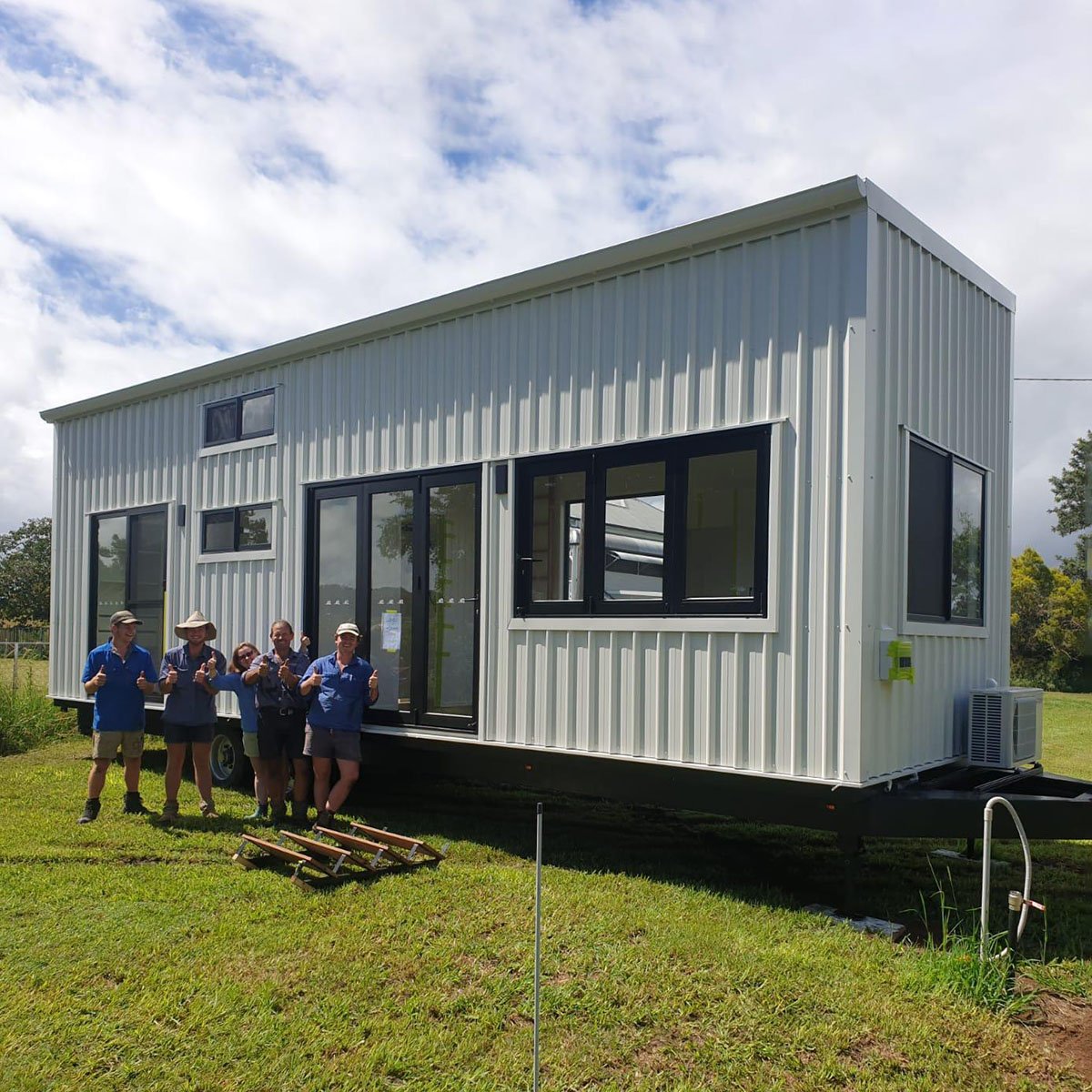 LJM Tiny House delivered to Gympie Queensland. Built on a Tiny House Transport 10x3m trailer.